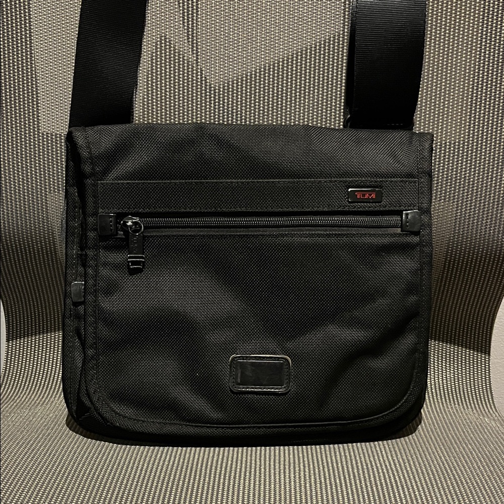 TUMI black mini messenger bag